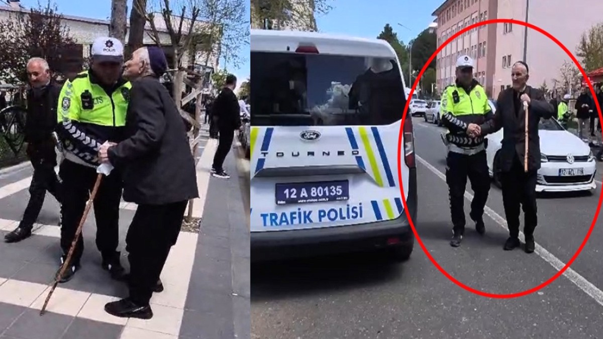 Kendisini yolun karşısına geçiren trafik polisini öptü